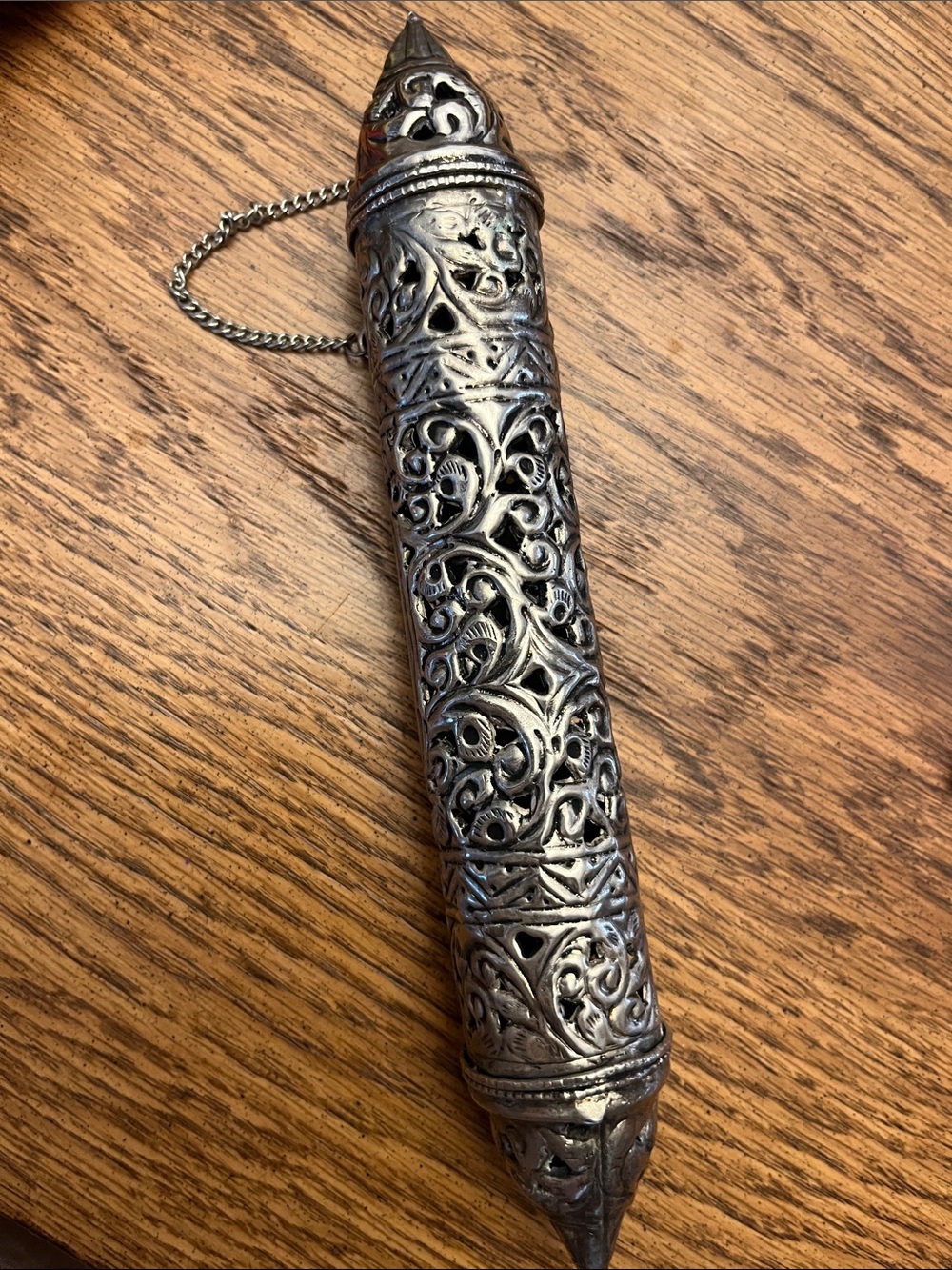 silver toned scroll case